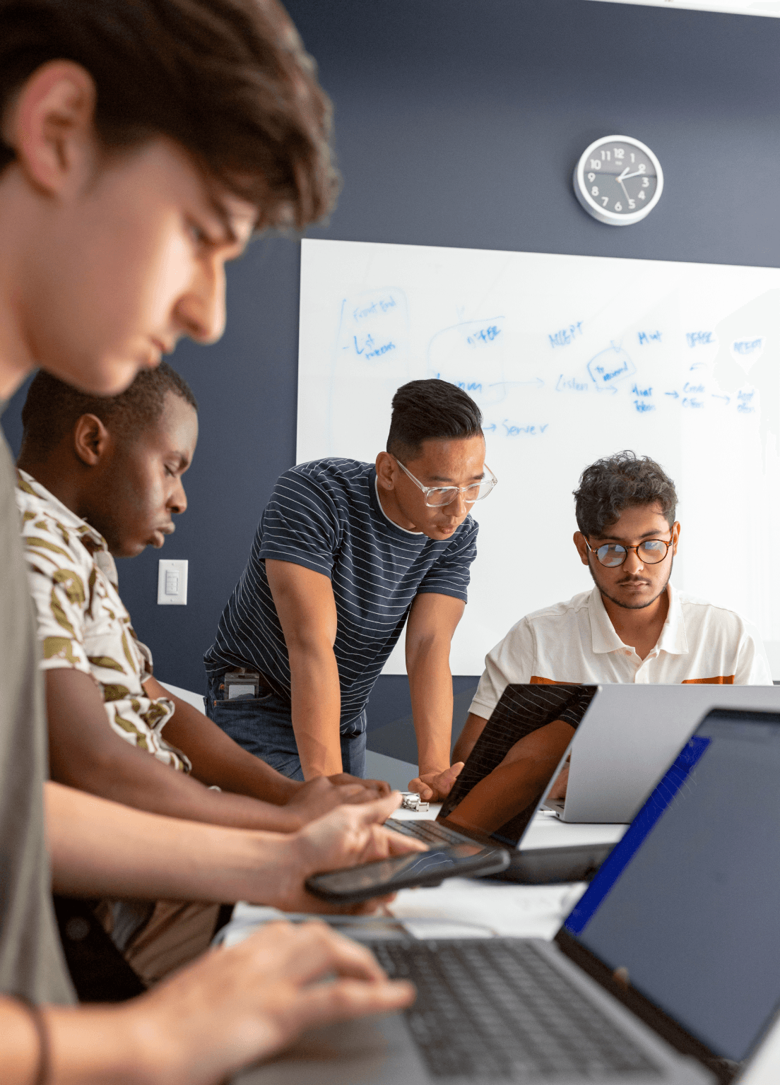 People looking at a computer screen