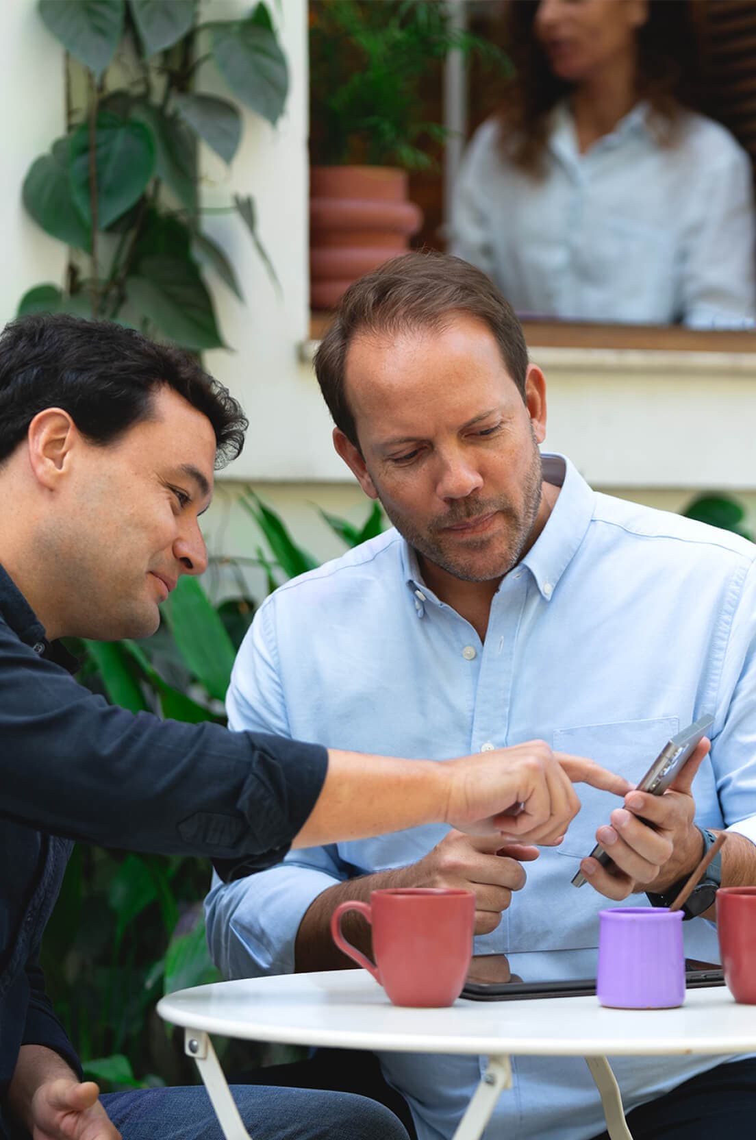 People looking at a mobile screen